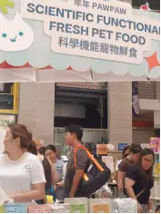 PAWPAW stall offering fresh pet food.