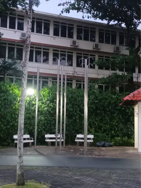 The school building and fence beside Tiong Bahru Park.
